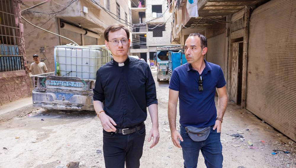 P. Gerald Baumgartner SJ und Allewelt-Chefredakteur Christoph Lehermayr