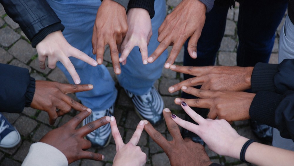 Hände von jungen Menschen